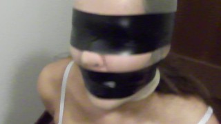 BLINDFOLDED AND GAGGED SLAVE TIED UP ON A CHAIR