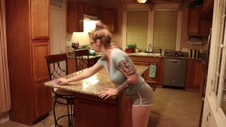 Cage the Mom cleaning a counter top for our pleasure