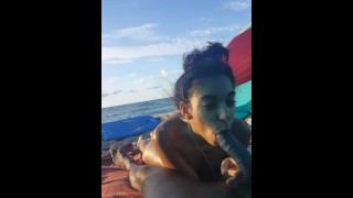 BBC blowjob on a beach