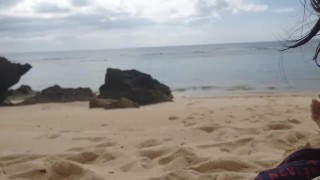 Cute Asian girlfriend sucking on the beach