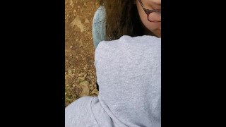 Girlfriend and her friend suck cock in woods